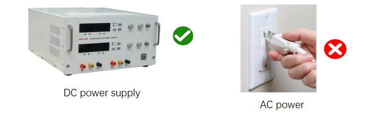 Correct DC power supply usage versus incorrect AC power connection